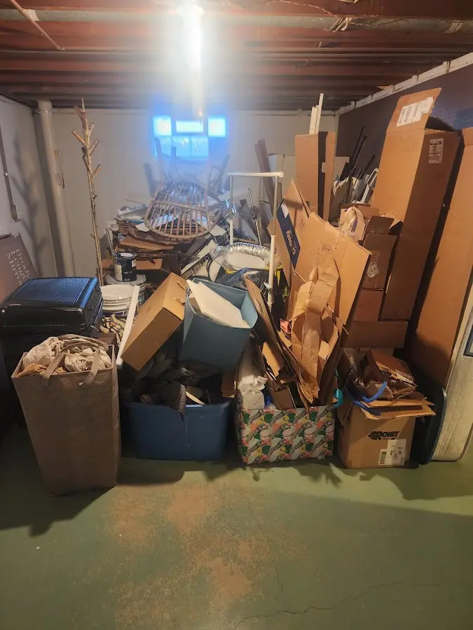 Roll-off dumpster container at job site for 2 Yard Dumpster Rental in Fortuna